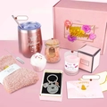 Detail view of rose gold birthday gift set including tumbler, candle and bath products - New Gift Set 2