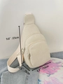 Cremefarbene Cord-Brusttasche mit verstellbarem Riemen und mehreren Reißverschlussfächern - Gebrochenes Weiß
