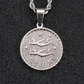 Silver Gemini zodiac coin necklace pendant with embossed twins figure on black background - Gemini / Steel