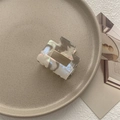 Detail of square marble pattern hair claw clip with pearlescent finish on ceramic tray - Small Square Claw / Phantom Grey