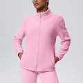 Detailed view of pink fleece zip-up sports jacket with high collar and side pockets - Sakura Pink