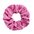 Detailed view of fuchsia satin scrunchie showing glossy fabric texture and elastic pleats - Leather Purple