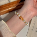 Elegant beaded pearl bracelet featuring a cute red tiger enamel charm for women - Zodiac Tiger Pearl (MY37706)