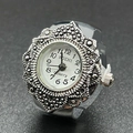 Vintage silver quartz finger ring watch featuring white dial and engraved floral patterns - White