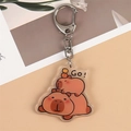 Porte-clés Capybara en acrylique avec personnages empilés et texte Go sur fond orange - Style 13 [N° B245]