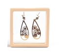 Golden teardrop hollow earrings with floral pattern and rhinestone in a clear display box - Shallow Apricot; 9*9*2cm