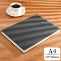 A4 size black notebook with soft nubuck leather texture on a wooden desk with shadows - Ruled / A4-Black