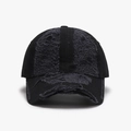 Distressed black denim baseball cap with vintage frayed holes and worn-out streetwear style - Black