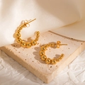 Close-up of 18k gold-plated C-shaped beaded hoop earrings with smooth metallic finish - C-Shape Gradient Metal Bead Studs