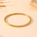 Detailed top view of gold-plated bamboo-style bangle with a secure snap closure - Gold Smooth Oval Style (S503)