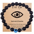 Men's Evil Eye bracelet with matte black tiger eye beads on a kraft gift card - Matte Black Bracelet