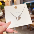 Collana in acciaio al titanio argento con ciondolo a cuore e pietre di zircone lucide - Stile Cuore e Anello Intrecciati (X775) / Argento