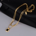 Double-layered gold necklace with black rectangular pendant and K18 hallmark detail - 18K Gold-Black
