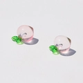 Macro shot of two transparent pink acrylic peach charms for DIY jewelry making - Pink Peach