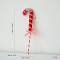 Red and white striped Christmas candy cane ornament with a velvet texture and ribbon bow - Slim Red Candy Cane