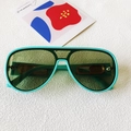 Mint green aviator sunglasses with transparent lenses and hollow metal temple details - Green