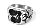 Macro view of vintage punk stainless steel ring with embossed gesture design on silver band - 24208