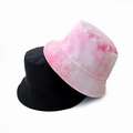 Detail of reversible cotton bucket hats in solid black and pink tie-dye patterns - Adult 55-58cm / Pink White Tie-dye