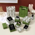 Detail of luxury emerald green jewelry boxes with white baroque patterns and gold accents - Without Bow / 7*7*3cm / Enamel White