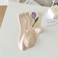 Beige crew socks with purple tulip pattern on a white surface with minimalist decor - Beige Tulip