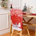 Detailed shot of red Christmas chair cover featuring forest gnomes and snowflakes - Red