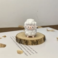 Detailed macro view of a handcrafted white wooden sheep figurine with pink accents - Sheep (Small) / Height approx 4cm