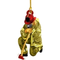 Christmas tree ornament featuring a heroic firefighter in yellow uniform with a red helmet - 10-Kneeling Firefighter