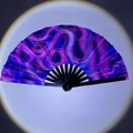 Handheld folding fan with vibrant psychedelic swirl pattern in electric blue and pink colors - Psychedelic Swirl UV Glow A39