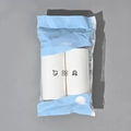 Two rolls of white lint roller refills in blue packaging for clothes cleaning - 2-Pack Refill Rolls (60 Sheets/Roll)