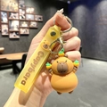 Cute Capybara keychain with orange accessories and yellow PVC strap with text - B241-5 Hand Raised
