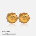 Macro detail of gold stainless steel earrings with hammer texture and white zircon stones - Gold Hammered Round with Zirconia Circle