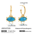 Detalle de pendientes de acero inoxidable dorado con piedras turquesas y dimensiones - Pendientes de turquesa ovalados (JDE0107039)