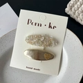 Set of tweed sequin barrette and golden heart hair clip on a white display card - Sequin Heart Clip