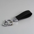 Minimalist black suede leather keychain with silver horseshoe D-ring and metal hardware - Silver/Black