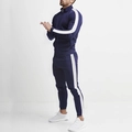 Detailed view of dark blue athletic set with white side stripes and stand collar zip jacket - Navy Blue and White