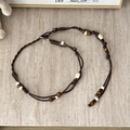 Detail view of woven brown leather cord with colorful ceramic beads and metal clasp - Coffee Rope Figure-8 Buckle - 111cm