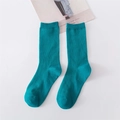 Deep green cotton crew socks with ribbed texture in a solid dopamine color style - Lake Green