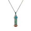 Macro shot of rainbow-plated wish bottle pendant with green stone chips inside - Dongling Green Chips