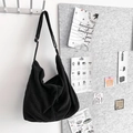 Minimalist black corduroy hobo bag with adjustable wide shoulder strap for women - Black
