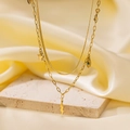 Macro detail of 18K gold-plated layered necklaces with star and evil eye charms - QYH1141 Lightning Evil Eye Necklace (Gold)