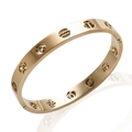Titanium steel gold-plated bangle featuring hollow zodiac symbols and a polished finish - Hollow Zodiac Sign / Rose Gold