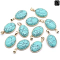 Eleven oval turquoise stone pendants with gold metal frames and textured veining patterns - Blue Turquoise (Synthetic)