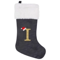 Detail of grey velvet Christmas stocking with a golden glitter letter I and faux fur cuff - Letter I