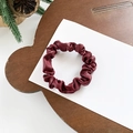 Elegant wine red satin scrunchie with a pleated design on a wooden tray - Small / Burgundy