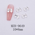 Detail of silver alloy bow nail charms with 10x8mm size and pink manicure display - Silver Bowknot-9649