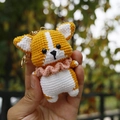 Handmade yellow and white crochet Corgi puppy keychain with pink collar and golden ring - Yellow Corgi Doll