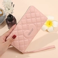 Pink heart quilted leather long wallet with wrist strap and metal zipper closure - Pink