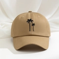 Close-up of khaki baseball cap featuring black palm tree embroidery on cotton fabric - Dark Khaki