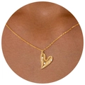 Detail of 18K gold heart pendant necklace featuring inlaid white pearls on O-chain - Heart Shape Zirconia Necklace