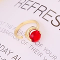 Adjustable gold ring with faceted red zircon stone shown at a 45-degree angle view - Adjustable Open / Red